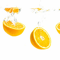 Buy canvas prints of Orange halves splashing into water panorama shoot by Przemek Iciak