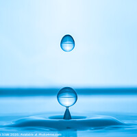 Buy canvas prints of Water drop splashing into blue water surface by Przemek Iciak