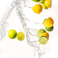 Buy canvas prints of Fresh limes and lemons with water splash in midair, isolated on white background by Przemek Iciak