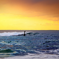 Buy canvas prints of  lone surfer rides the wave of the ocean at sunset by federico stevanin