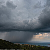Buy canvas prints of Dark large stormy clouds over hills and sea by federico stevanin