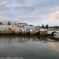 Buy canvas prints of Tavira city view with river gilao in Algarve at sunset, Portugal by Luis Pina