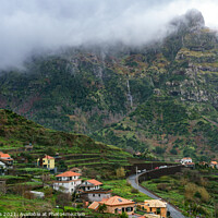 Buy canvas prints of Village and beautiful mountains with clouds, in Madeira by Luis Pina