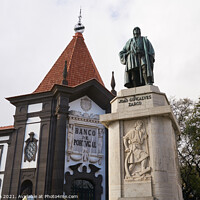 Buy canvas prints of Statue of navigator João Gonçalves Zarco in Funchal, Madeira with Bank of Portugal on the background by Luis Pina