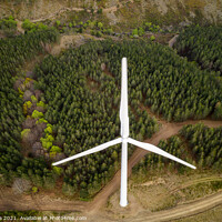 Buy canvas prints of Wind turbines drone aerial view renewable energy on the middle of clouds in Serra da Lousa, Portugal by Luis Pina