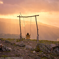 Buy canvas prints of Woman girl social distancing swinging on a Swing baloico in Lousa mountain, Portugal at sunset by Luis Pina