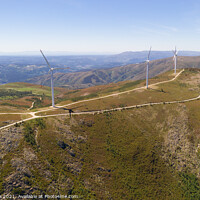 Buy canvas prints of Wind turbines drone aerial view renewable energy on the middle of Serra da Freita Arouca Geopark, in Portugal by Luis Pina
