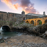 Buy canvas prints of Peniche Fortress with beautiful historic bridge at sunset, in Portugal by Luis Pina