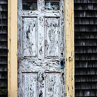 Buy canvas prints of Old wooden door with weathered paint by Miro V