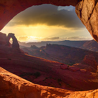 Buy canvas prints of Delicate Arch through a window by BRADLEY MORRIS