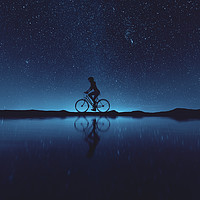 Buy canvas prints of Silhouette of young woman cyclist at night sky,3d  by chainat prachatree