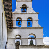 Buy canvas prints of White Adobe Steeple Bells Mission San Diego de Alcala California by William Perry