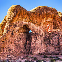 Buy canvas prints of Parade of Elephants Rock Canyon Windows Section Arches National  by William Perry