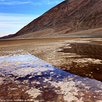 Buy canvas prints of Badwater with Black Mountains Death Valley National Park Califor by William Perry