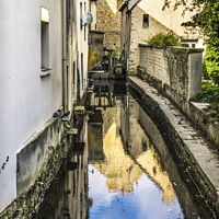 Buy canvas prints of White Buildings City Center Aure River Reflection Bayeux France by William Perry