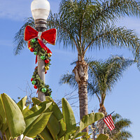 Buy canvas prints of Christmas Wreath Street Light Lantern Decorations Ventura Califo by William Perry
