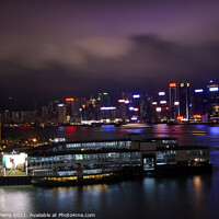 Buy canvas prints of Hong Kong Harbor Clock Tower at Night from Kowloon Star Ferry by William Perry