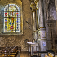 Buy canvas prints of Candles Stained Glass Church St Marie Eglise Normandy France by William Perry