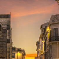 Buy canvas prints of Sunset Apartments Balconies Narrow Street Nimes France by William Perry