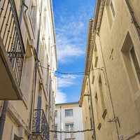 Buy canvas prints of Apartments Balconies Christmas Decorations Narrow Street Nimes G by William Perry