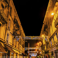Buy canvas prints of Christmas Decorations Street Shops Stores Nimes Gard France by William Perry