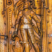Buy canvas prints of Wooden Saint Mauritius Statue Door Church Lucerne Switzerland  by William Perry