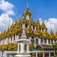 Buy canvas prints of Loha Prasat Hall Wat Ratchanaddaram Worawihan Bangkok Thailand by William Perry