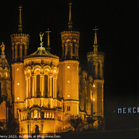 Buy canvas prints of Basilica of Notre Dame Illuminated Outside From Downtown Lyon Fr by William Perry
