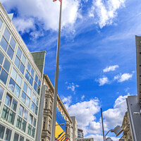 Buy canvas prints of Checkpoint Charlie Flag Today Restaurants West Berlin Germany by William Perry