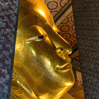 Buy canvas prints of  Face Reclining Buddha Front Wat Pho Bangkok Thailand by William Perry