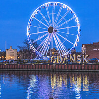 Buy canvas prints of Ferris Wheel Illuminated Inner Harbor Port Motlawa River Gdansk  by William Perry