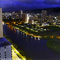 Buy canvas prints of Colorful Illuminated Night Buildings Waikiki Ala Wai Canal Honol by William Perry