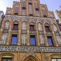 Buy canvas prints of Facade Copernicus House Torun Poland by William Perry