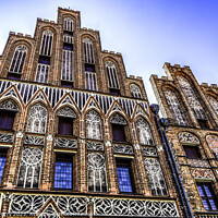 Buy canvas prints of Facade Copernicus House Torun Poland by William Perry