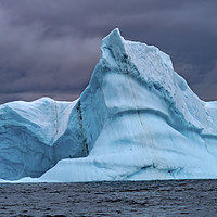 Buy canvas prints of Floating Blue Iceberg Antarctica by William Perry