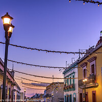 Buy canvas prints of Colorful Mexican Illuminated Street Evening Oaxaca Mexico by William Perry