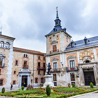 Buy canvas prints of Plaza de la Villa Casa de Cisneros Admiral Bazan Statue Madrid Spain by William Perry