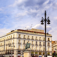Buy canvas prints of Puerta del Sol Plaza King Carlos Statue Madrid Spain by William Perry
