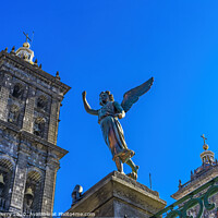 Buy canvas prints of Facade Angel Outside Puebla Cathedral Mexico by William Perry