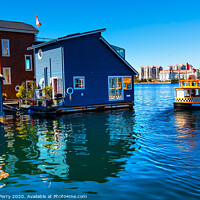 Buy canvas prints of Water Taxi Blue Houseboats Victoria Canada by William Perry