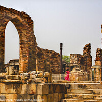 Buy canvas prints of Indian Girl Running in Qutab Minar Ruins New Delhi India by William Perry