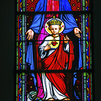 Buy canvas prints of Colorful Mary Jesus Bishop Stained Glass Notre Dame Tahiti by William Perry