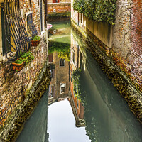 Buy canvas prints of Colorful Small Canal Venice Italy by William Perry