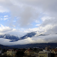 Buy canvas prints of Dramatic sky over the city of Merano, South Tirol, by Alfred S. Sikula