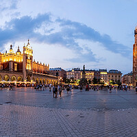Buy canvas prints of A panorama picture of Krakow`s Main Square Rynek Główny featuring the Cloth Hall, St. Mary`s Basilica and the Town Hall Tower by Arpan Bhatia