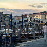 Buy canvas prints of Venice, Italy A couple walking holding hands against rialto bridge, a famous place known as one of the romantic destination by Arpan Bhatia