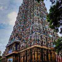 Buy canvas prints of Madurai, South India - November 02, 2018: One of the hindu religious temple amongst many in Meenakshi temple against blue sky by Arpan Bhatia