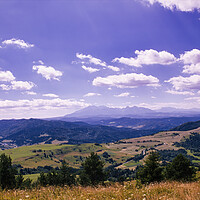 Buy canvas prints of Bielsko Biala, South Poland: Wide angle view of Polish mountains from south in summer against dramatic clouds. Beskidy mountains in Silesia near slovakia border. by Arpan Bhatia