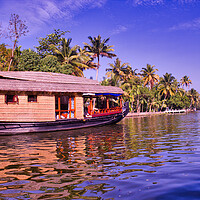 Buy canvas prints of House boat in a the city of Kerala back waters in India by Arpan Bhatia