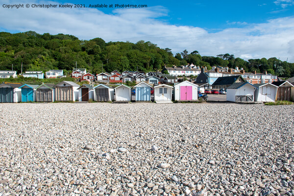 Lyme Regis beach huts Picture Board by Christopher Keeley
